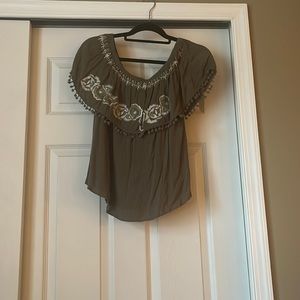 Off the shoulder olive green top with white flower accents